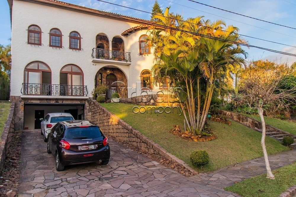 Casa em Condomínio com 552m², 3 quartos, 3 suítes, 6 vagas, no bairro Cavalhada em Porto Alegre